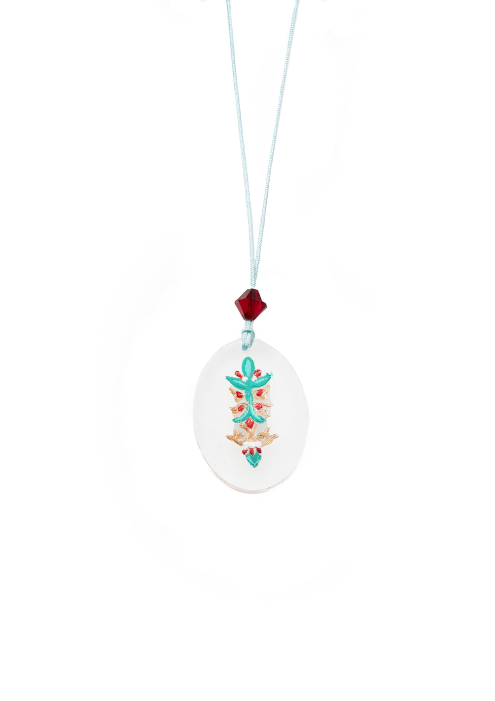 Oval pendant with repoussé flower